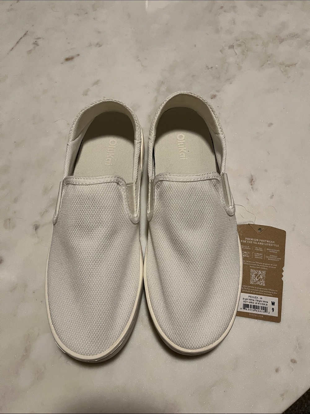 OluKai Off-White Canvas Slip-On Sneakers